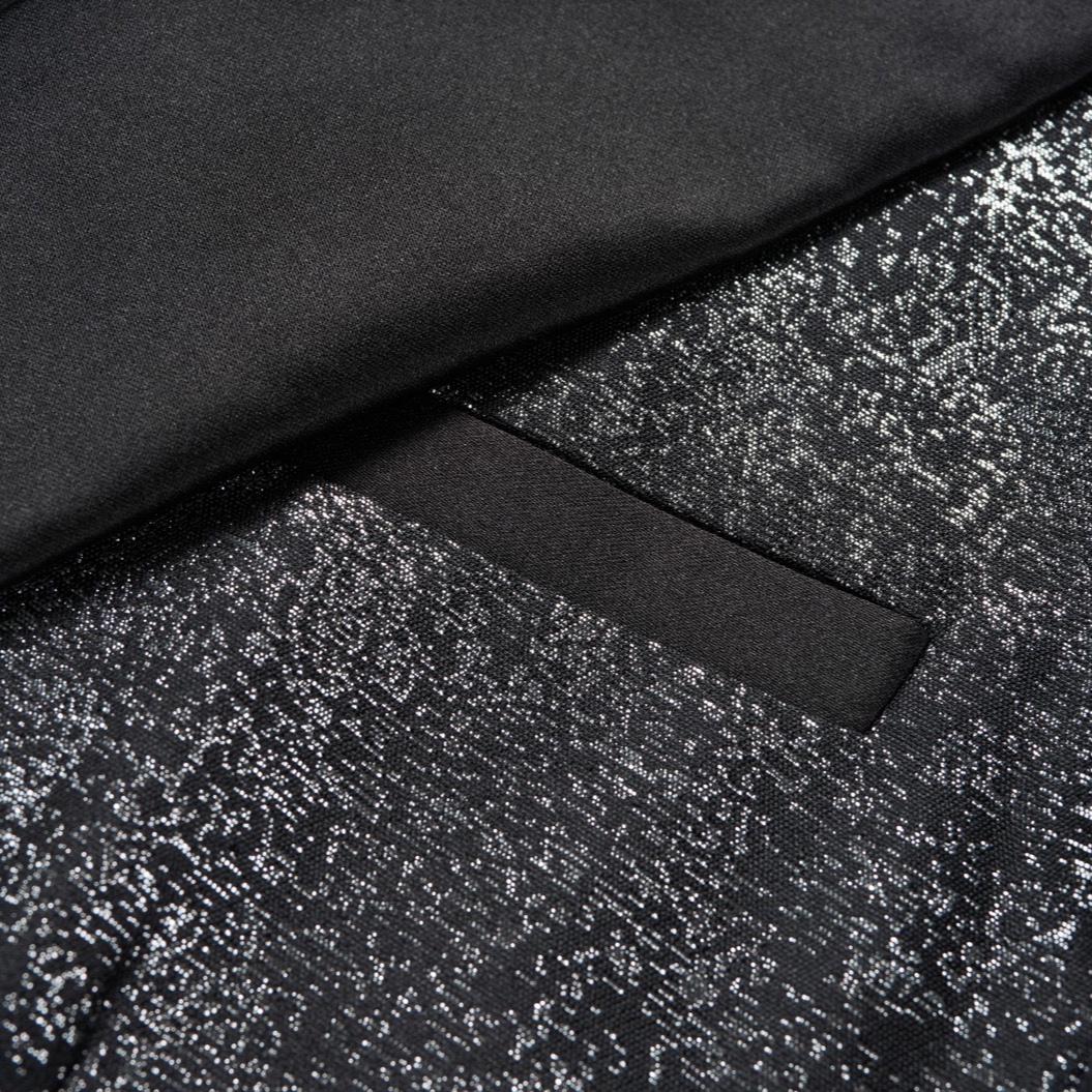 Front view of a men's sparkling black glitter tuxedo jacket with black satin peak lapels and one button closure.
