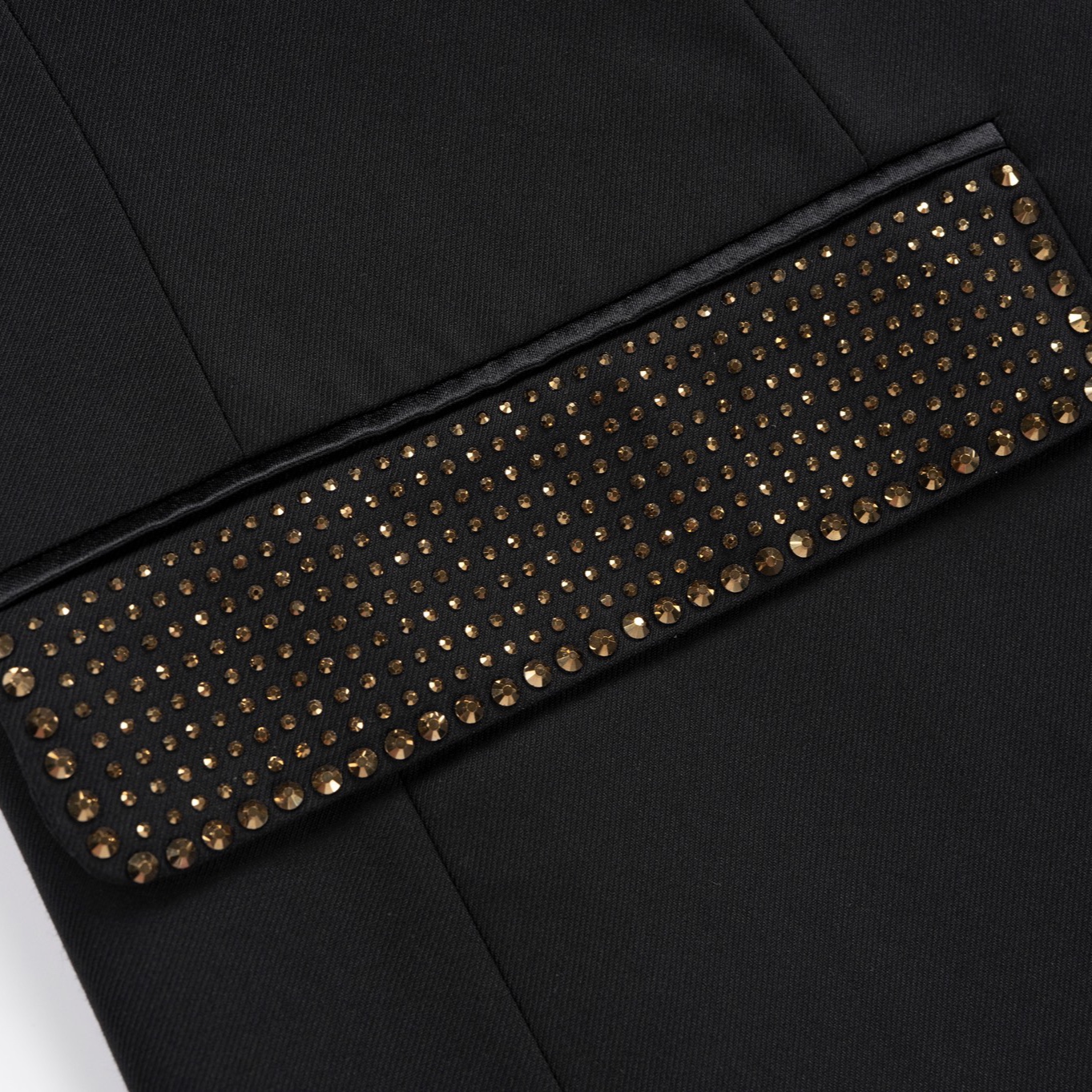Front view of a men's black slim fit 3-piece suit with gold sequin lapels and pocket trim, including blazer, vest, and