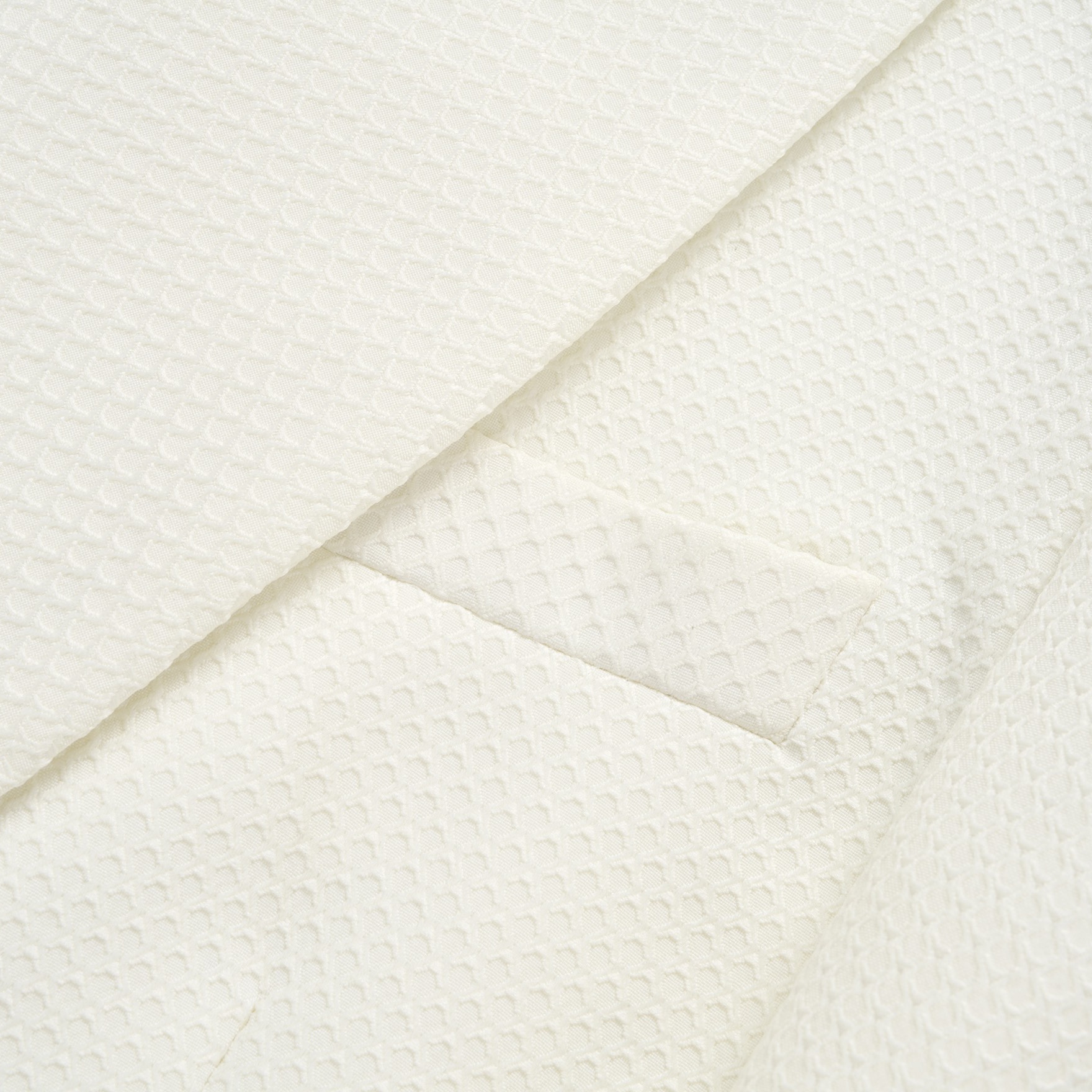 Front view of a Doohoob men's white textured double-breasted suit with shawl lapel and matching trousers.