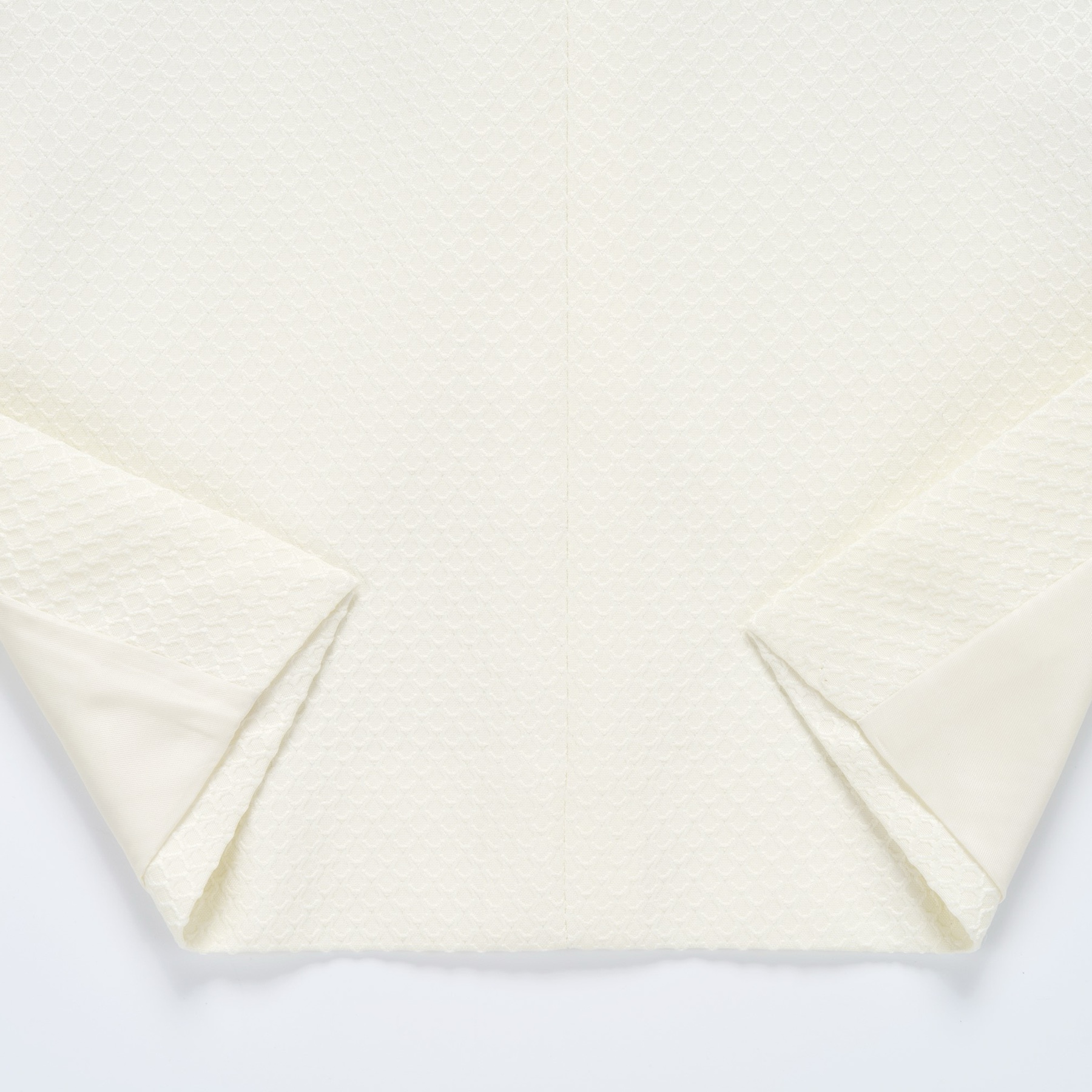 Front view of a Doohoob men's white textured double-breasted suit with shawl lapel and matching trousers.