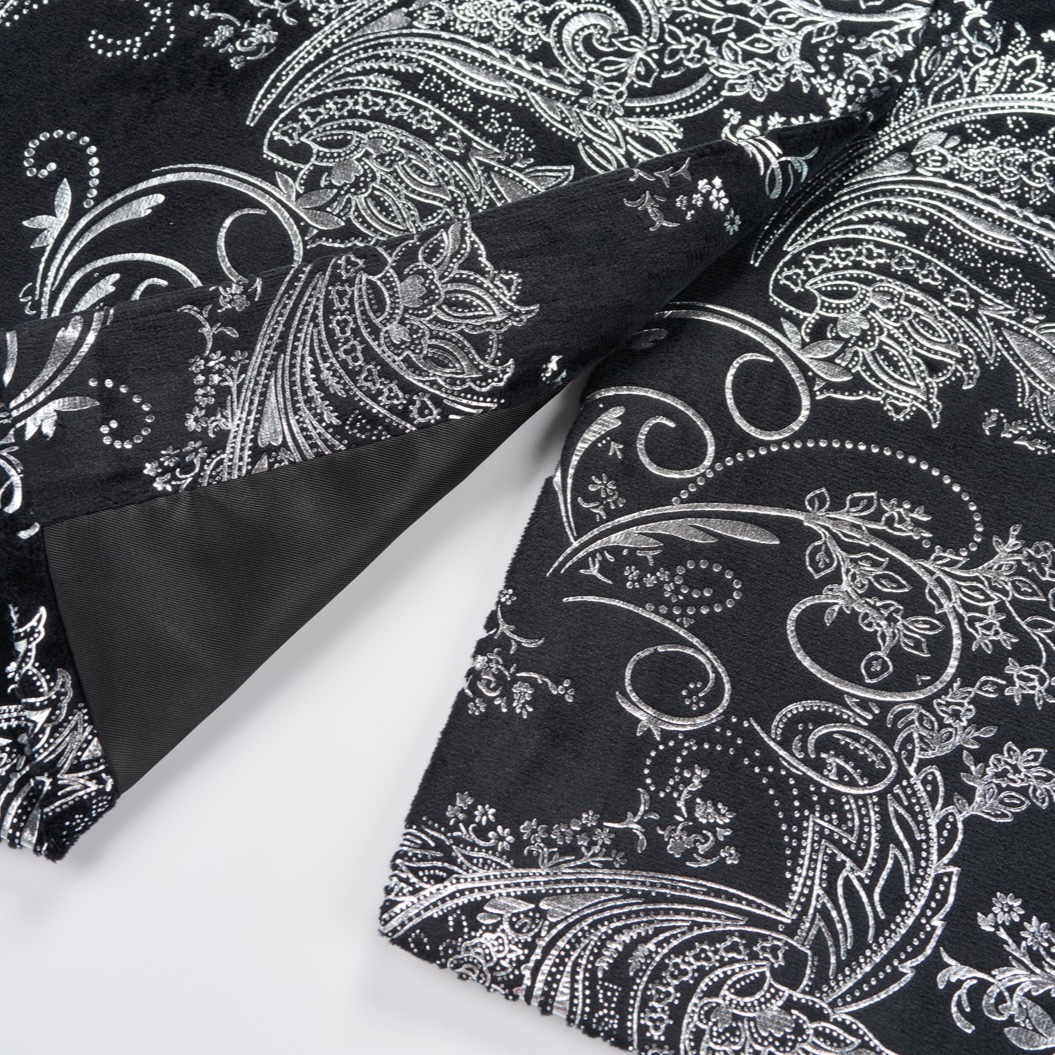 Front view of a men's black blazer with silver paisley pattern and black velvet shawl lapel.
