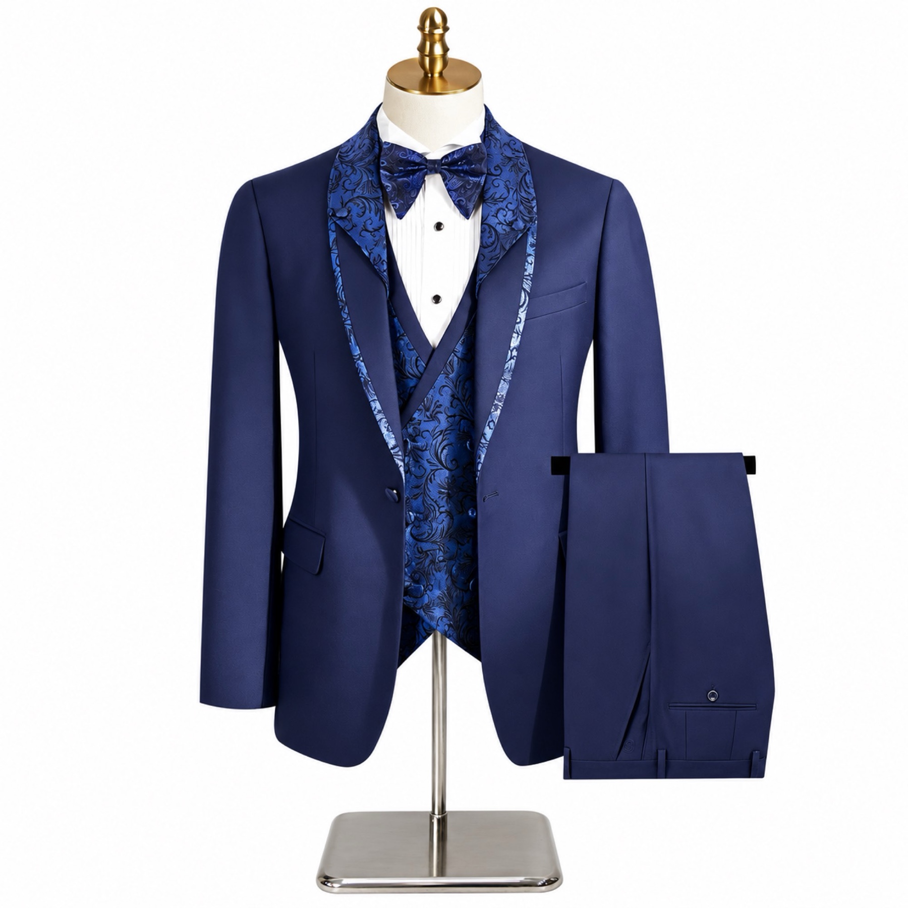Black men's 3-piece tuxedo suit with silver and black patterned shawl lapel and matching vest, worn on a mannequin.