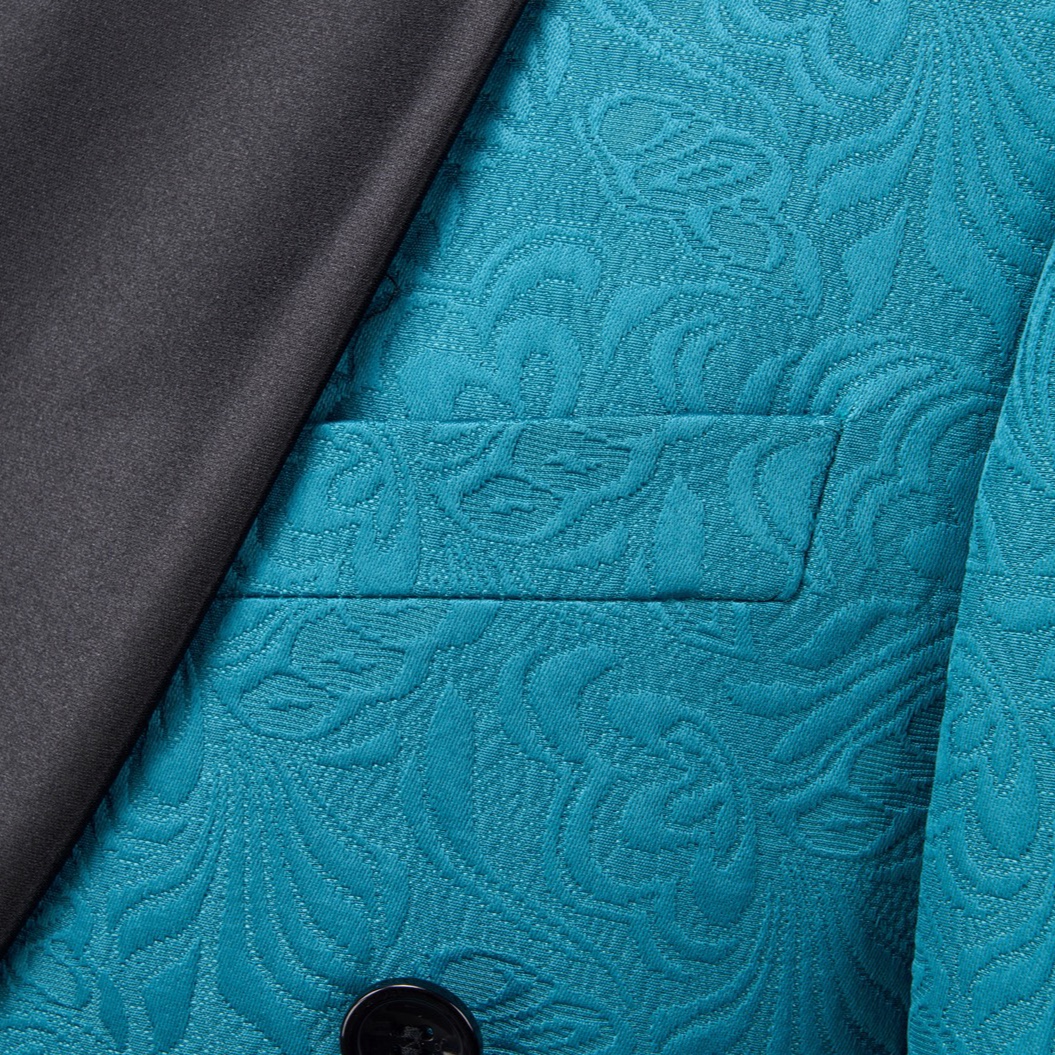 Full view of a men's teal jacquard double-breasted suit with black shawl lapel and matching trousers.
