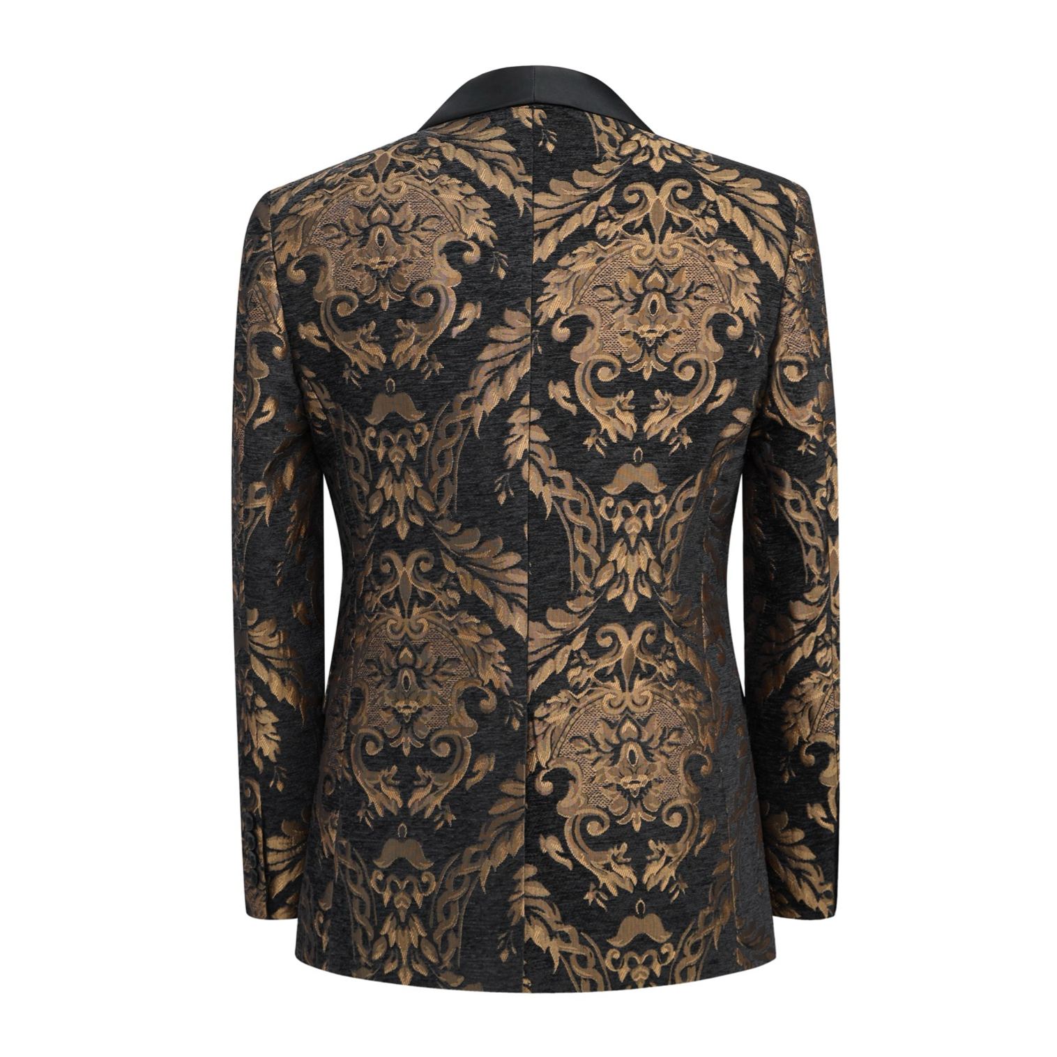 Front view of a men's black and gold damask patterned tuxedo suit with a black satin shawl lapel and one button closure.
