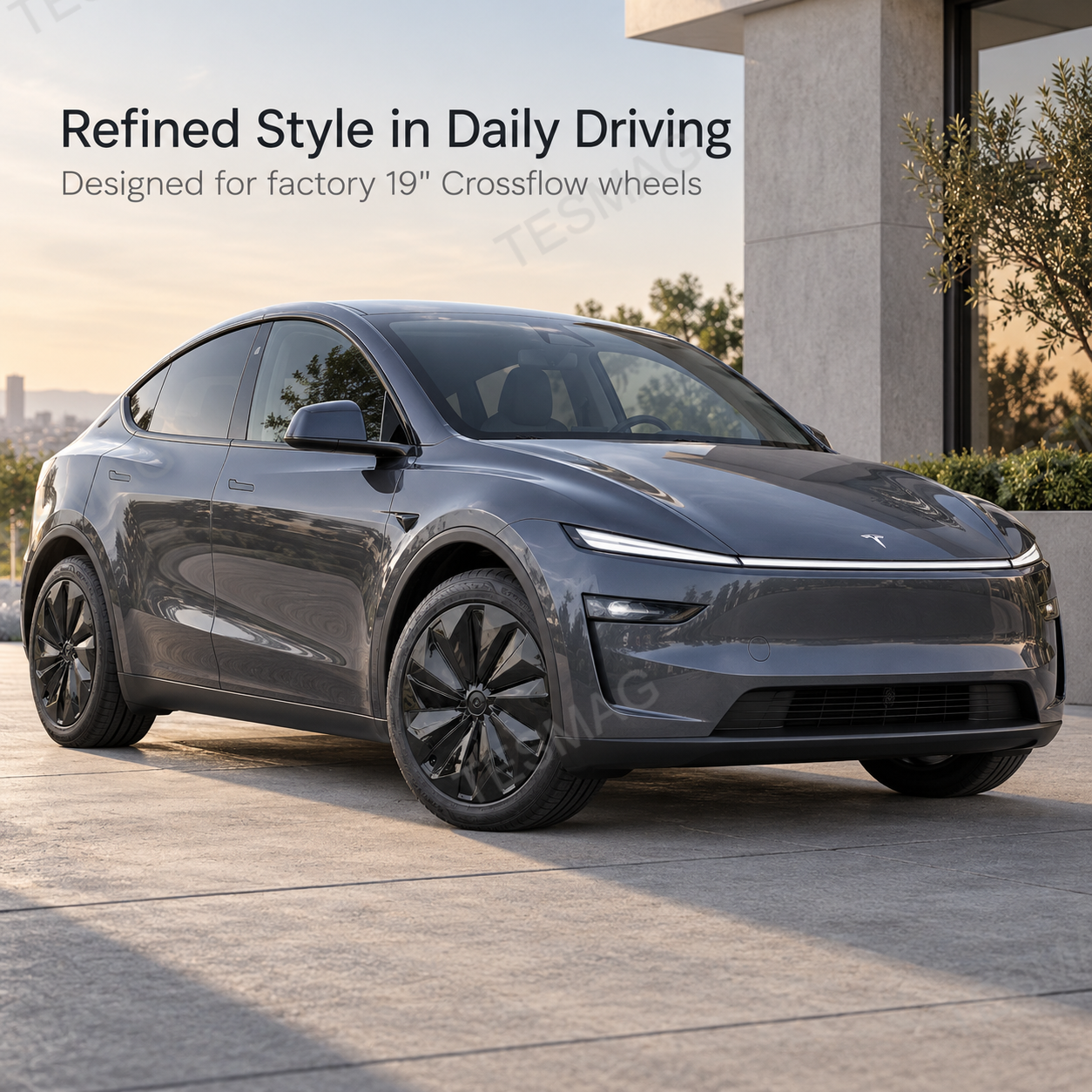 Deep gray Tesla Model Y Juniper with gloss black 19-inch Crossflow wheel covers