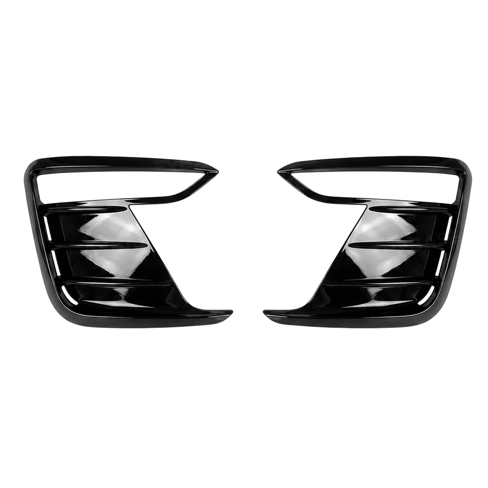 Gloss black left and right front bumper accent trim covers on a white background