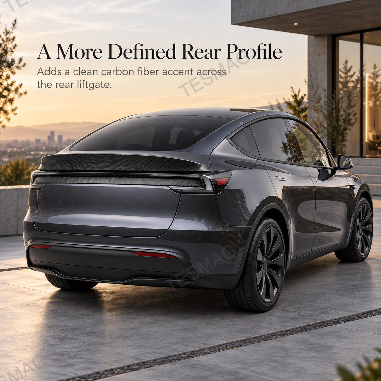 Model Y Juniper rear three-quarter view with carbon fiber trunk spoiler installed