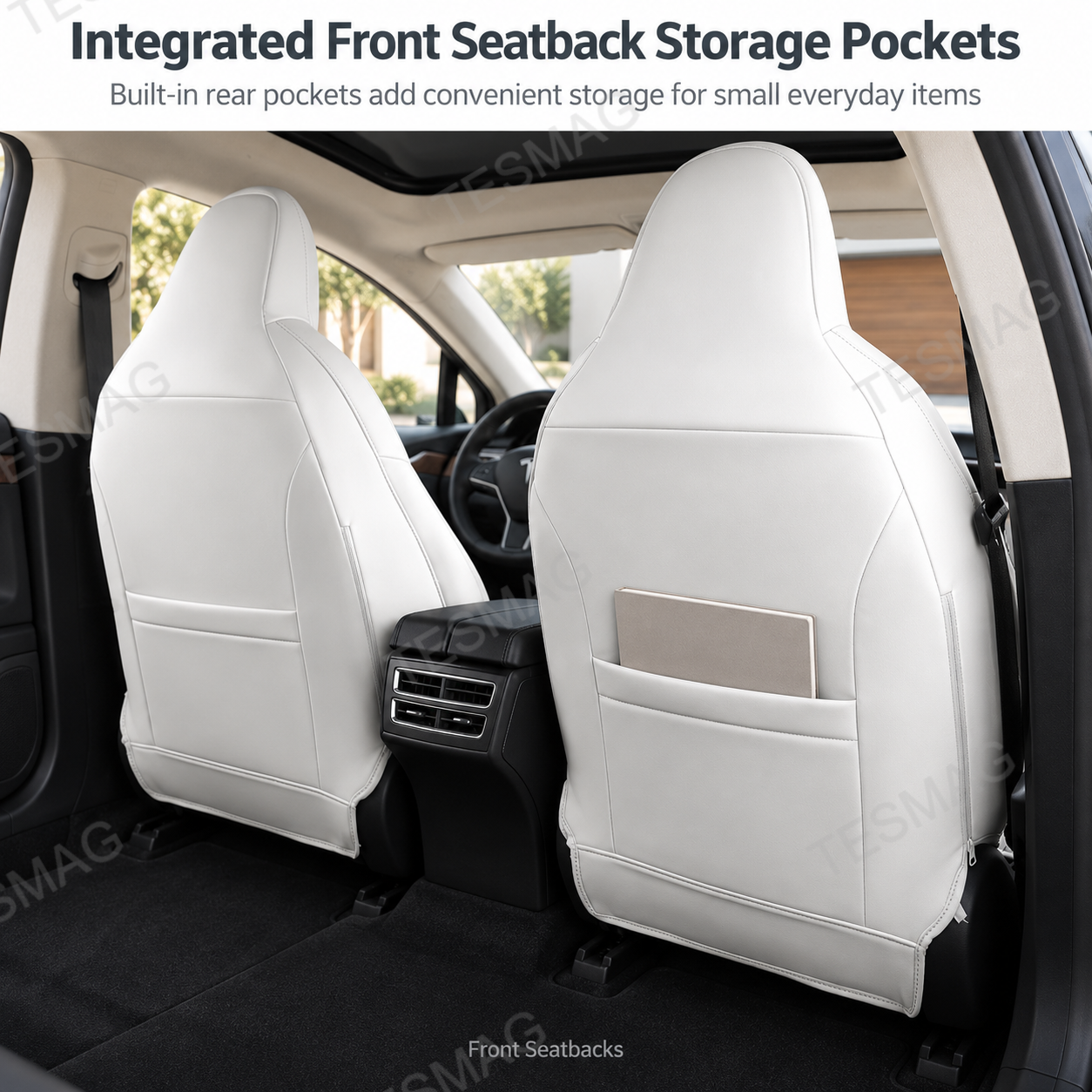 Rear view of white Nappa leather Tesla front seat covers featuring integrated seatback pockets holding a tablet