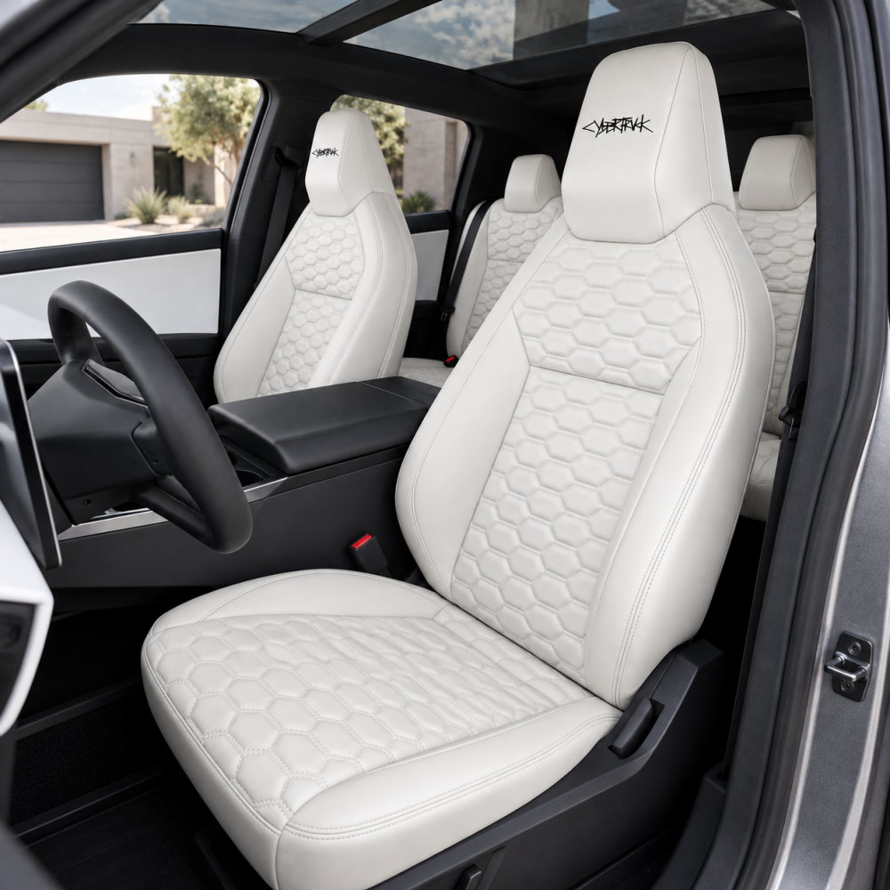 White hexagonal-quilted seat covers installed in a Tesla Cybertruck 2024+ interior