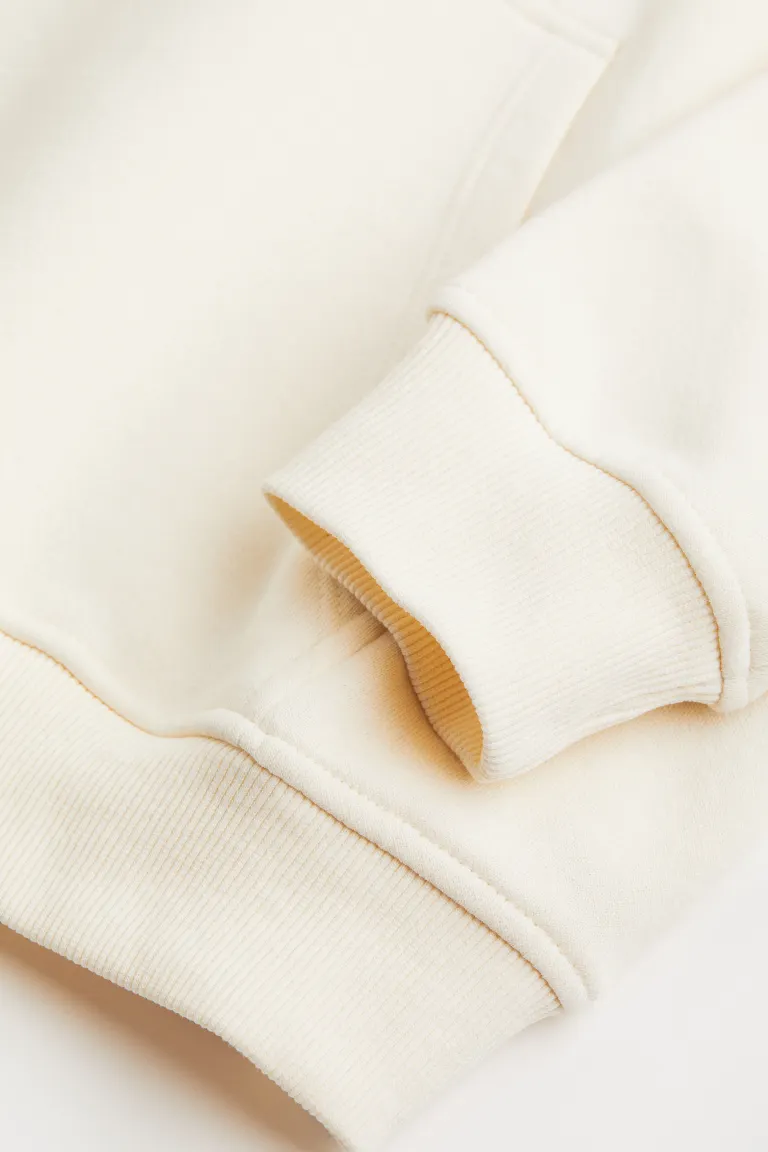 Beige and white hoodie