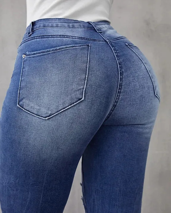 90S VINTAGE DISTRESSED ZIP FLY RAW HEM FLARE LEG JEANS