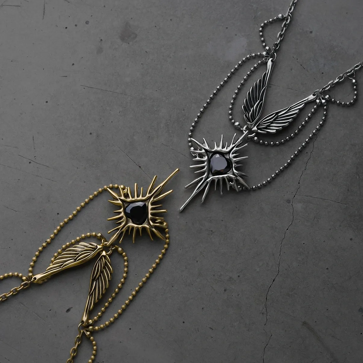 CELESTIAL STARBURST WINGS NECKLACES