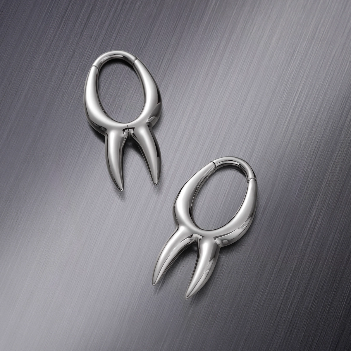 ABSTRACT FLOW EAR WEIGHTS