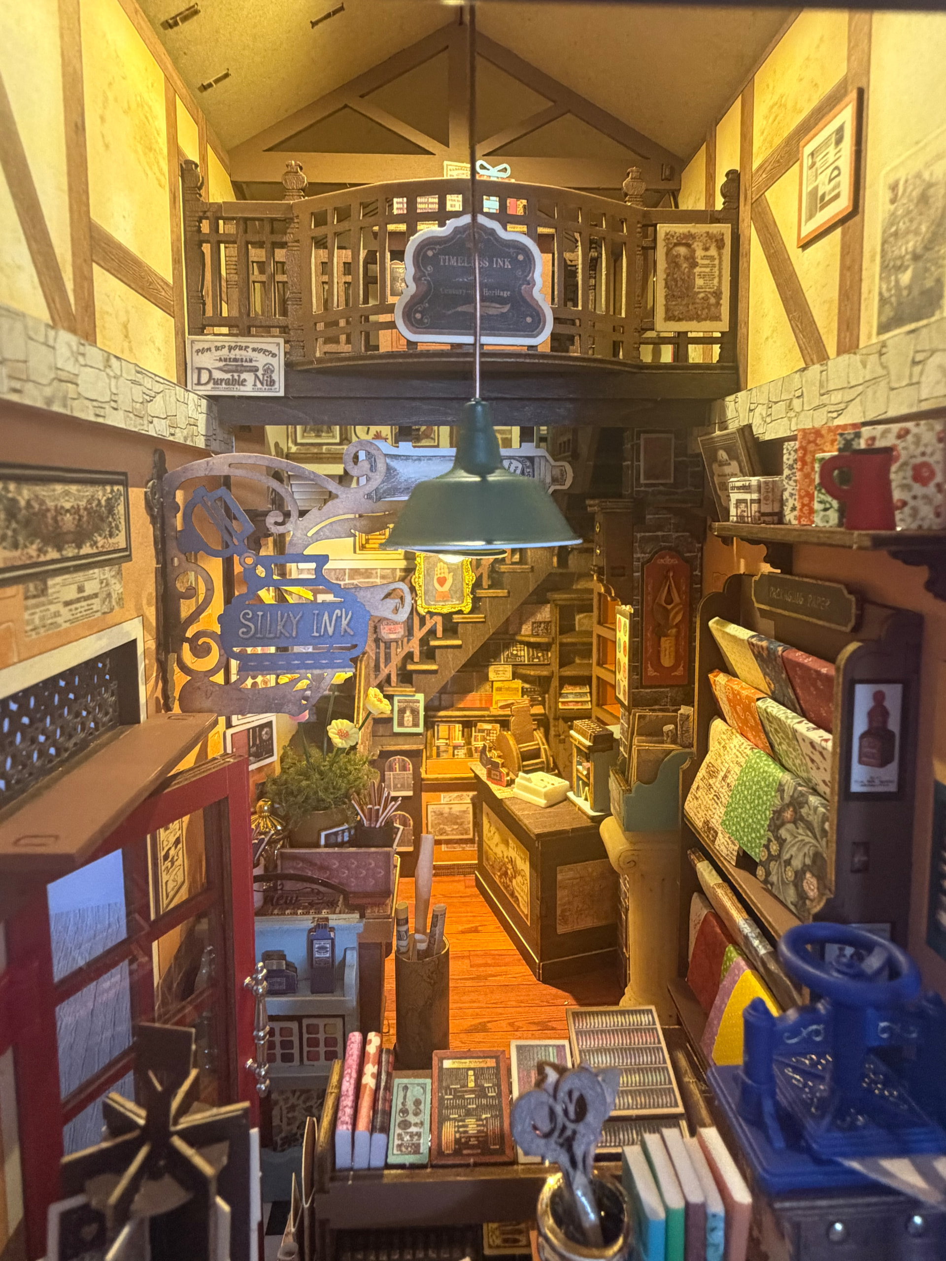The illuminated upper loft and central aisle, photographed by Melanie Goult