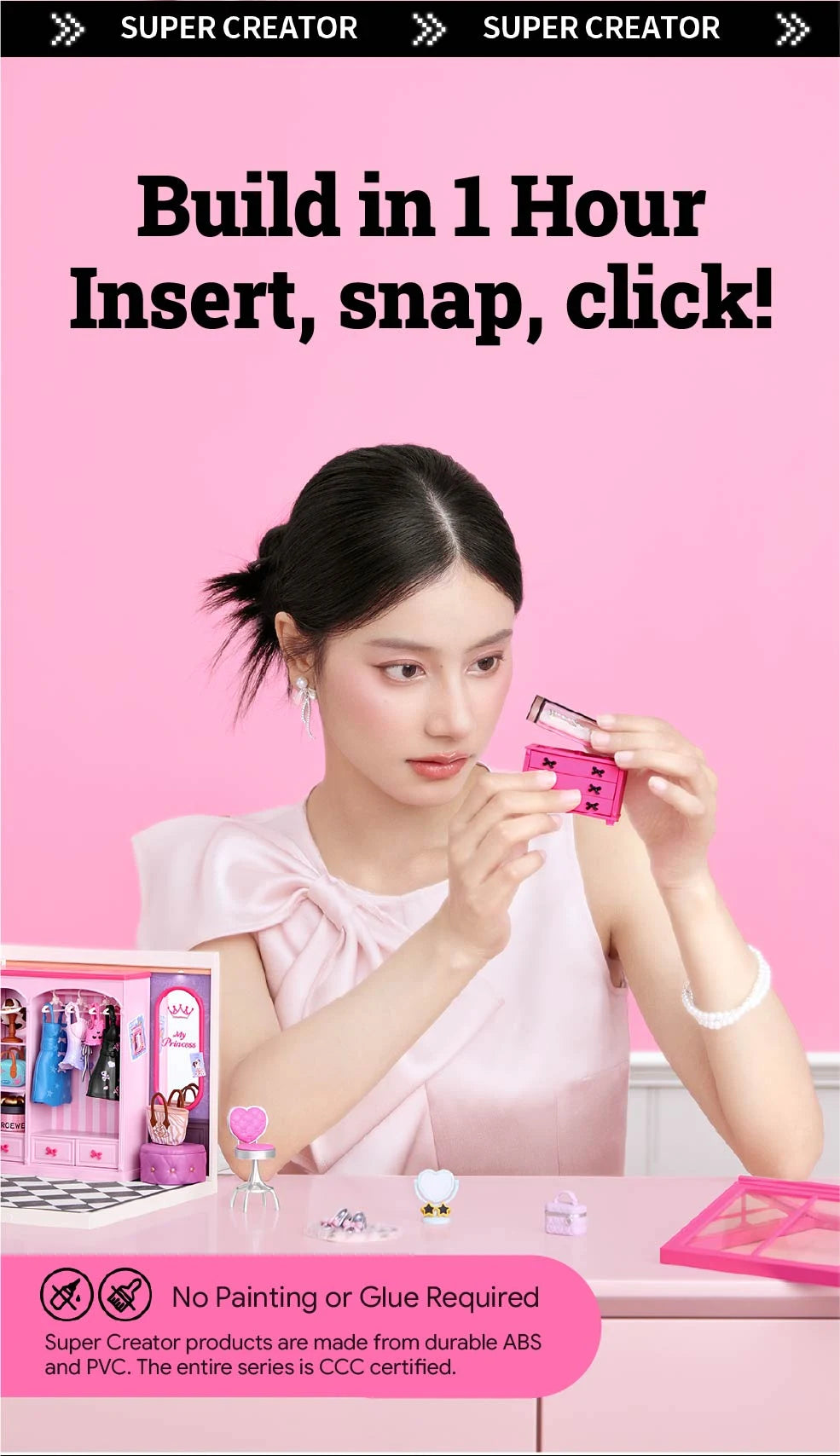Person holding a small pink drawer unit beside a miniature closet, with tiny accessories on a pink table; text reads Build in 1 Hour and No Painting or Glue Required.