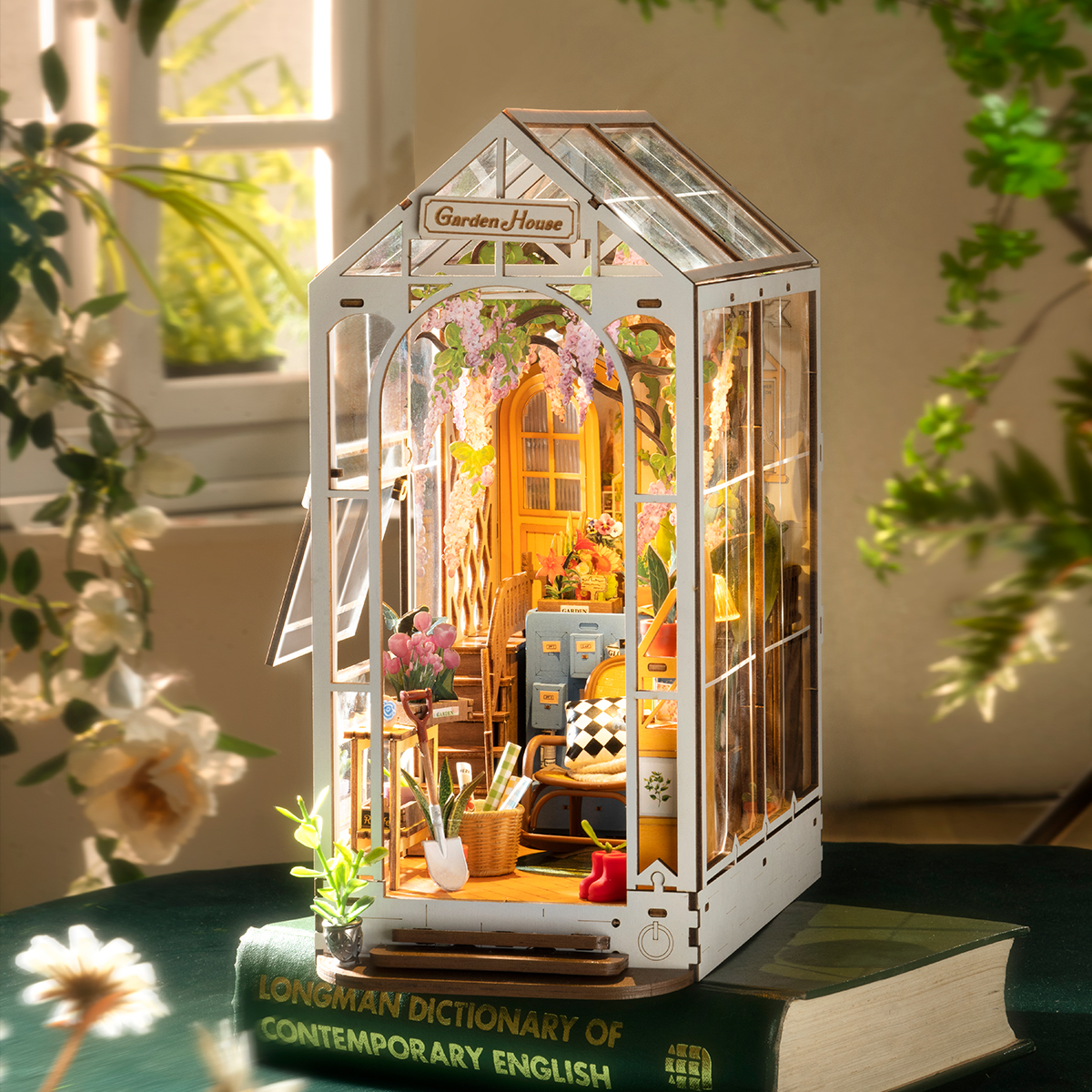 Rolife Holiday Garden House TGB06 botanical book nook displayed on a tabletop