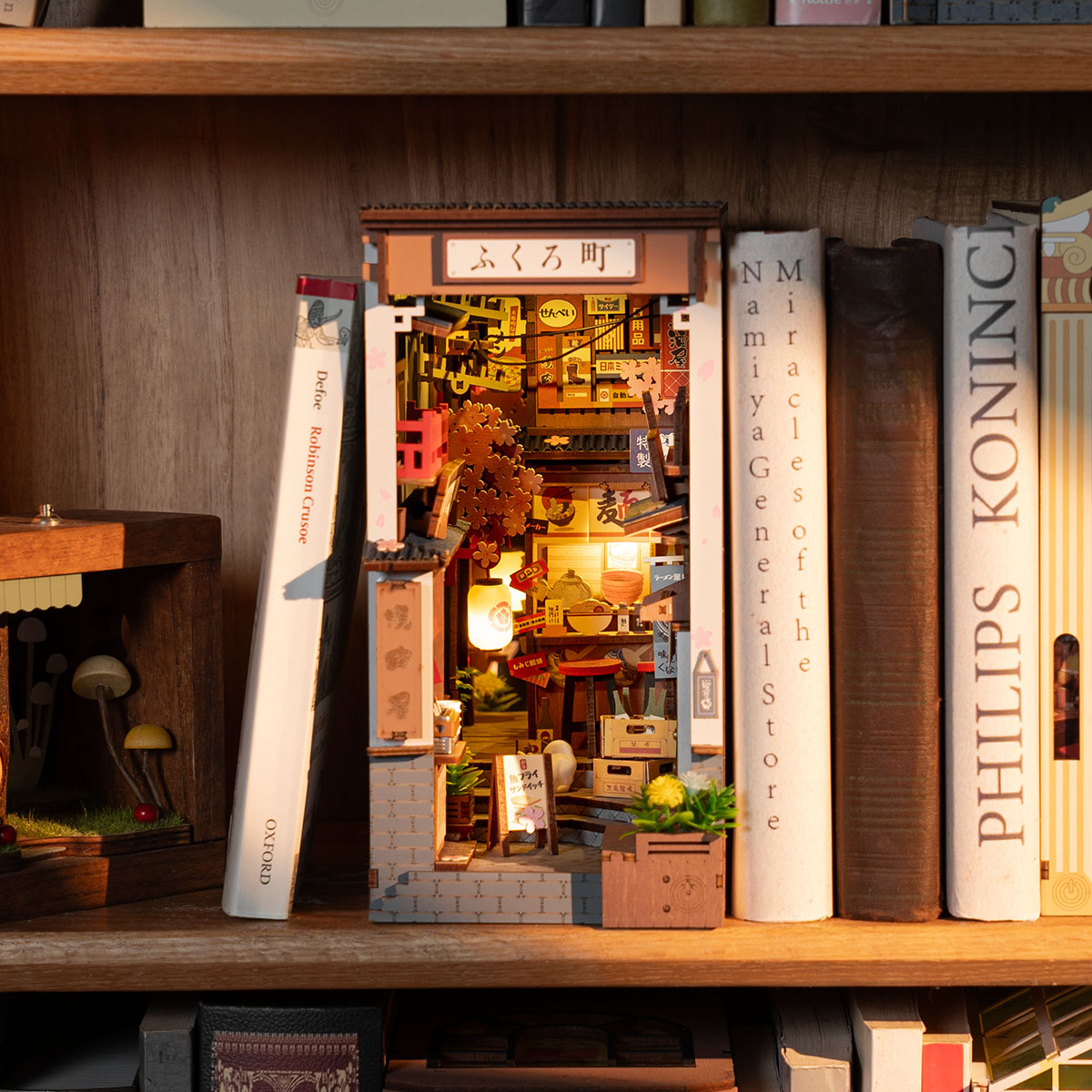 Rolife Book Nook Shelf Insert - Sakura Wine Alley TGB11 on the book shelf