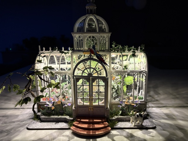 Illuminated Oxygen Oasis casting greenhouse shadows