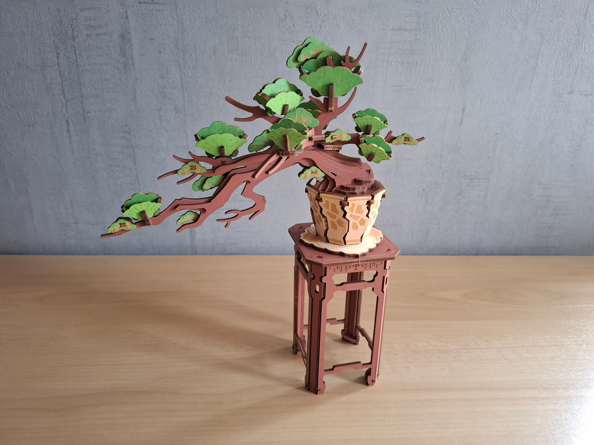 An assembled Pine Bonsai Model on table