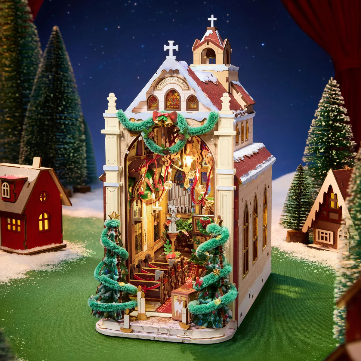 Rolife Caroling Cathedral TGB26 with its warmly lit interior and Christmas trees