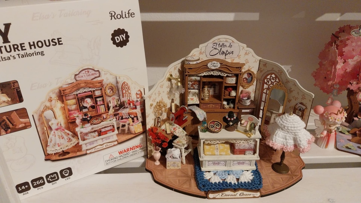 Elsa’s Tailoring becomes “Olimpia’s Workshop”