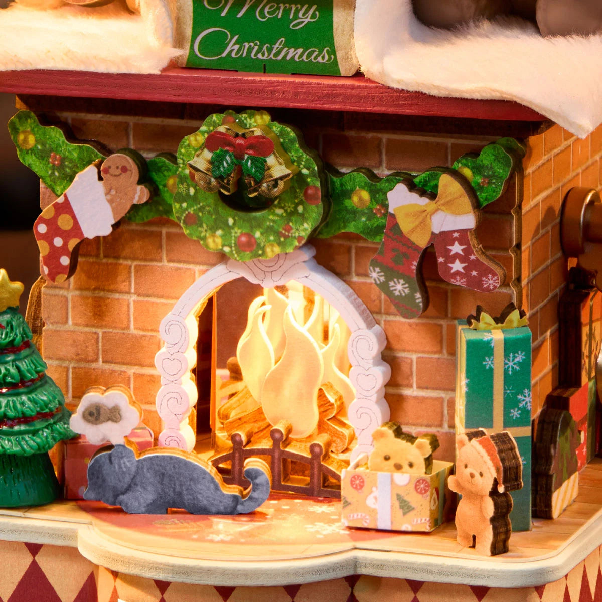 Close-up of the glowing fireplace, wreath, stockings, tree, and figures in Fireside Music Night AMS03