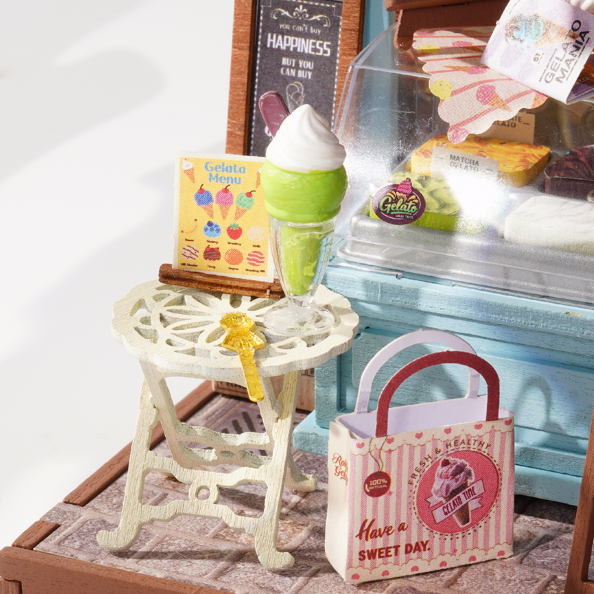 Close-up van Gelato Stall Shop tafel, hoorntje, boodschappentas en details van de winkelgevel