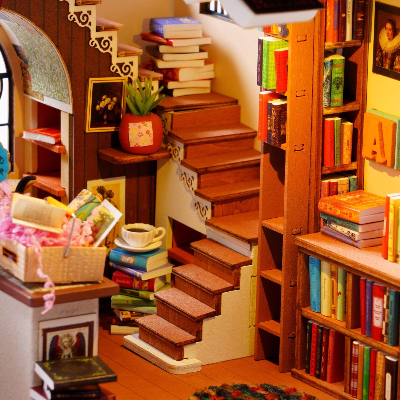 Pagestory Books wooden staircase surrounded by miniature books and artwork