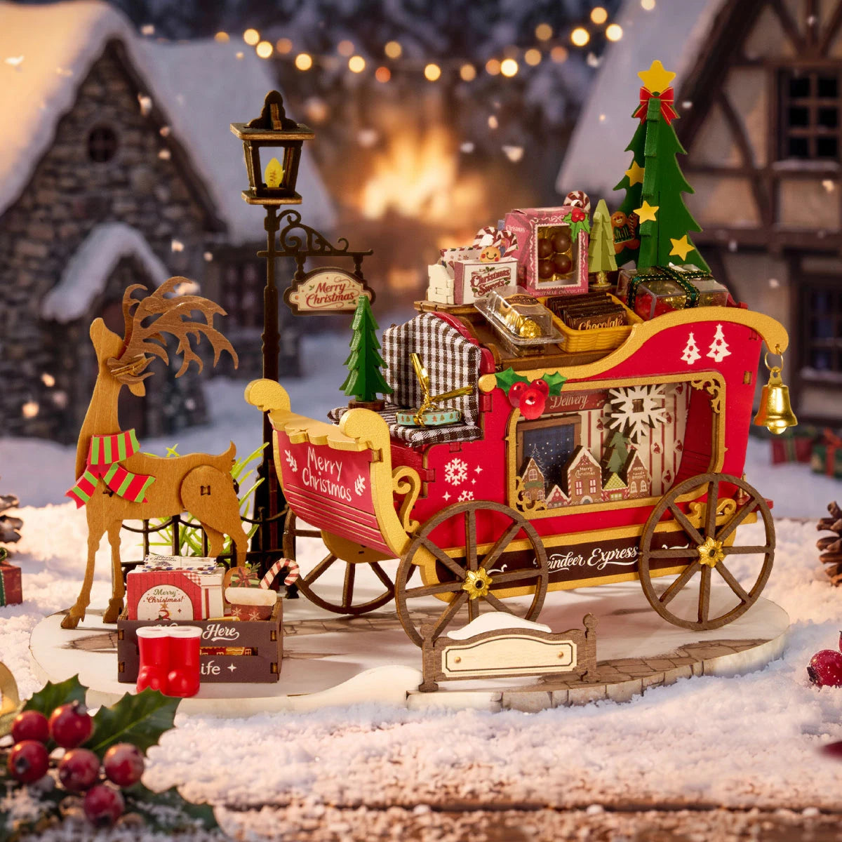Reindeer Express miniature sleigh displayed in a snowy village with warm Christmas lights