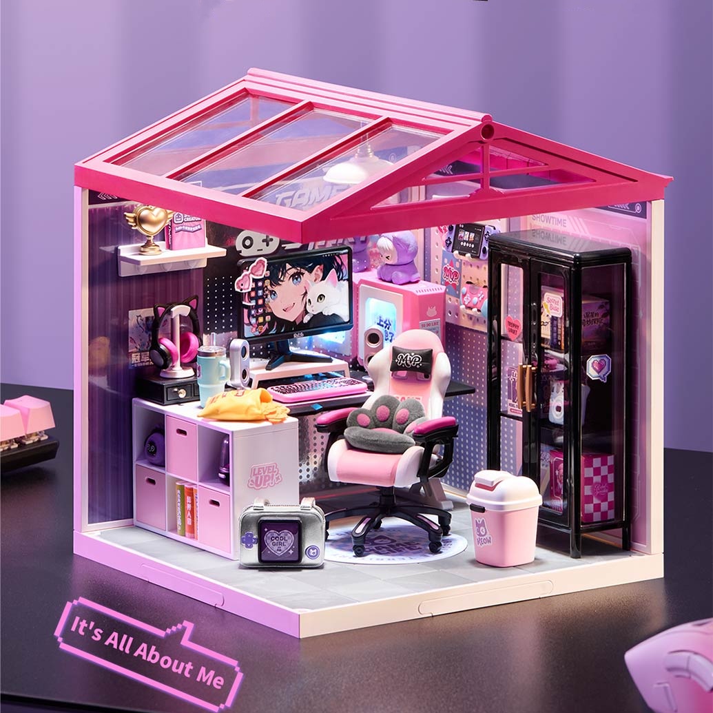 Das Miniatur-Gamingzimmer Rolife Gamer Queen DW031 mit Gamingstuhl, Computer-Setup und pink-lila Dekor