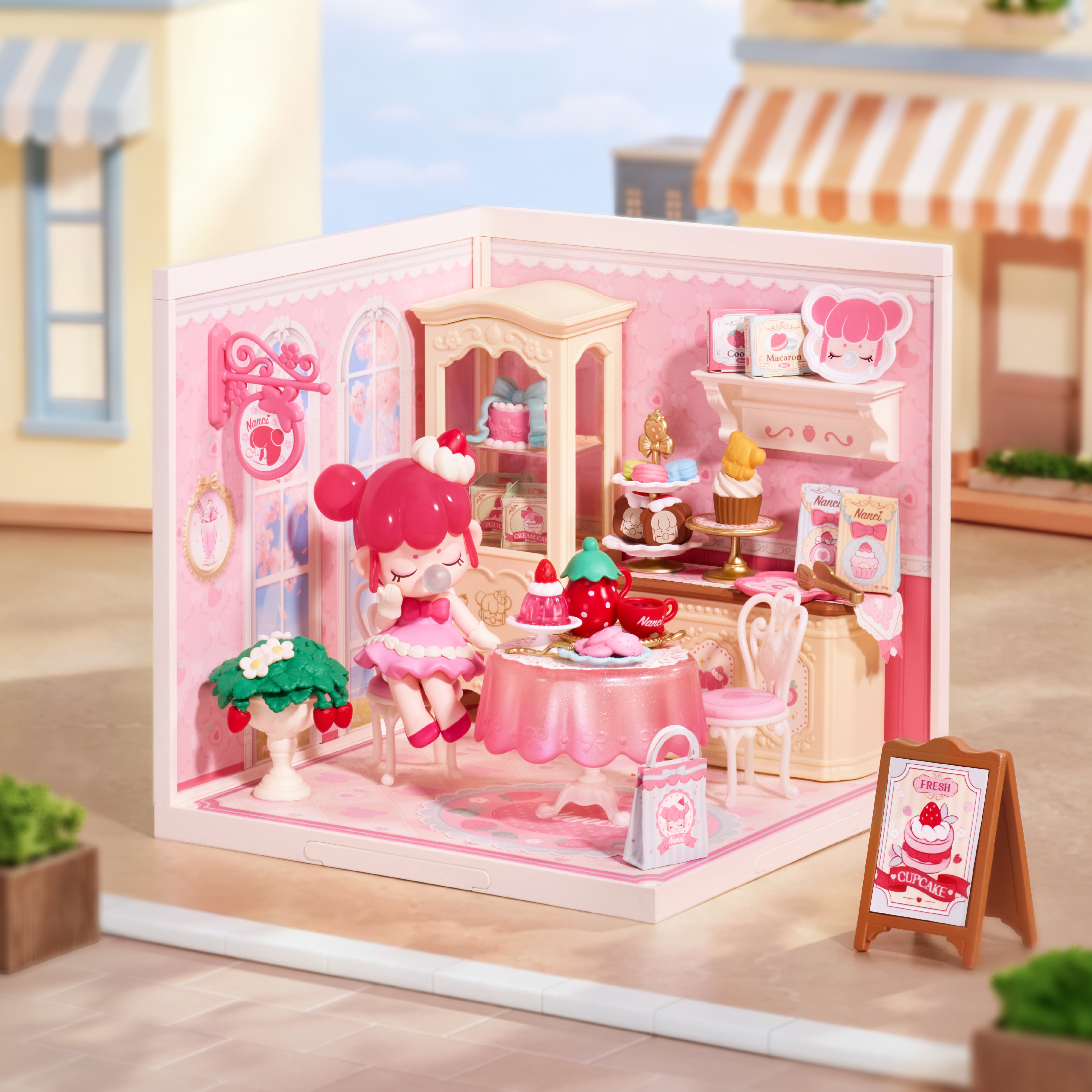 Nanci Strawberry Teatime miniature house displayed as a pastel strawberry dessert cafe