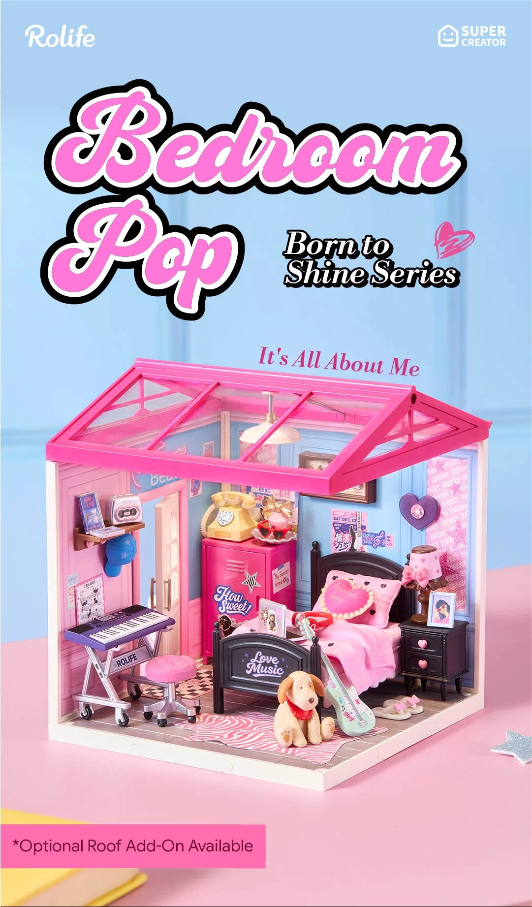 Rolife Bedroom Pop miniature bedroom with pink roof frame, keyboard on stand, bed with heart pillow, pink cabinet, dog figure and guitar on a pink surface.