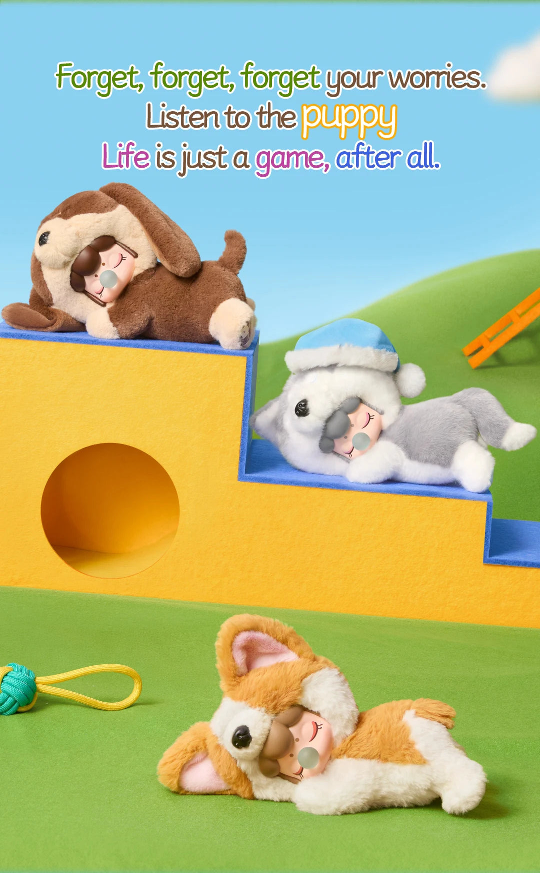 Nanci Puppy Club group scene showing Dachshund, Husky and Corgi plush dolls lounging on yellow-and-blue playground blocks, with a rope toy and an illustrated message about forgetting worries and enjoying life.