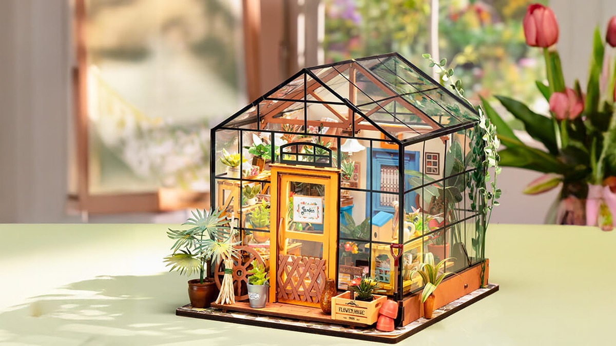 Rolife Cathy's Flower House DG104 displayed on a table for the assembly guide