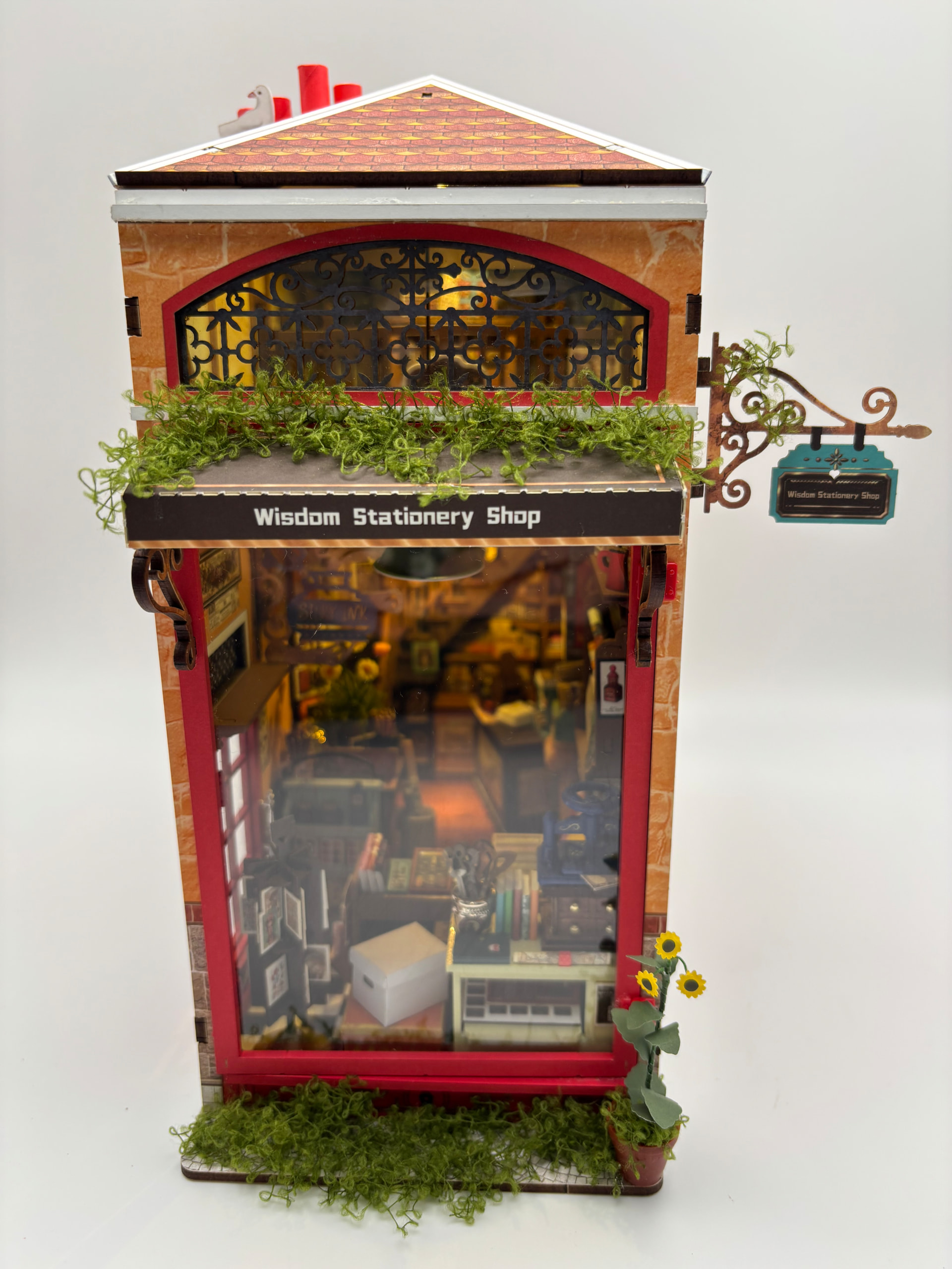 Customized Wisdom Stationery Shop with added greenery, photographed by Tkaplan