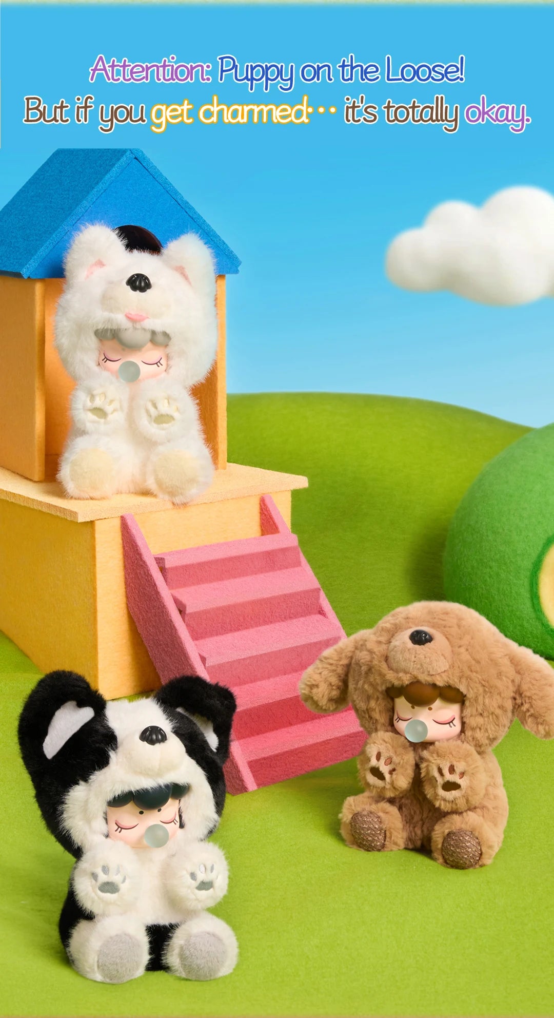Nanci Puppy Club group promotional graphic showing Samoyed, Border Collie and Teddy plush dolls around a yellow doghouse with a blue roof and pink stairs on a green miniature playground.