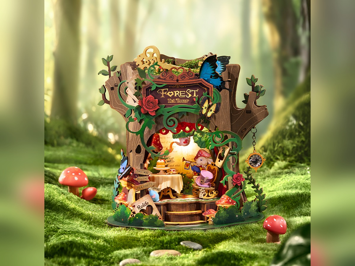 Rolife Forest Tea Party DIY music box displayed in a woodland scene