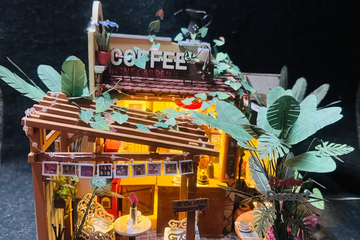 Completed Rolife Leafree Cafe DH201 glowing in warm light by Rolife Community maker ThaoNguyen