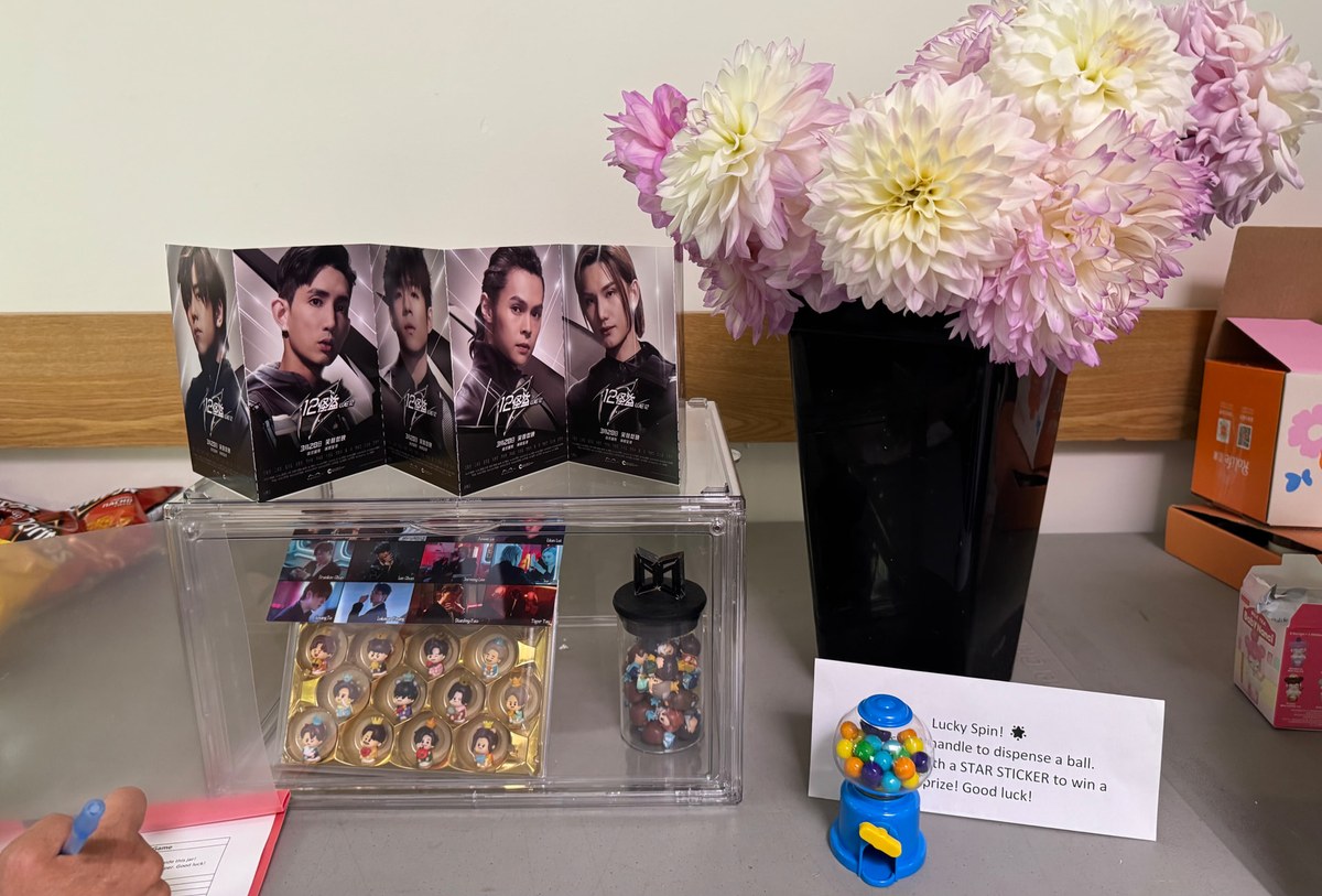 Mirror figures, flowers, and prizes prepared for games at the Markham meetup