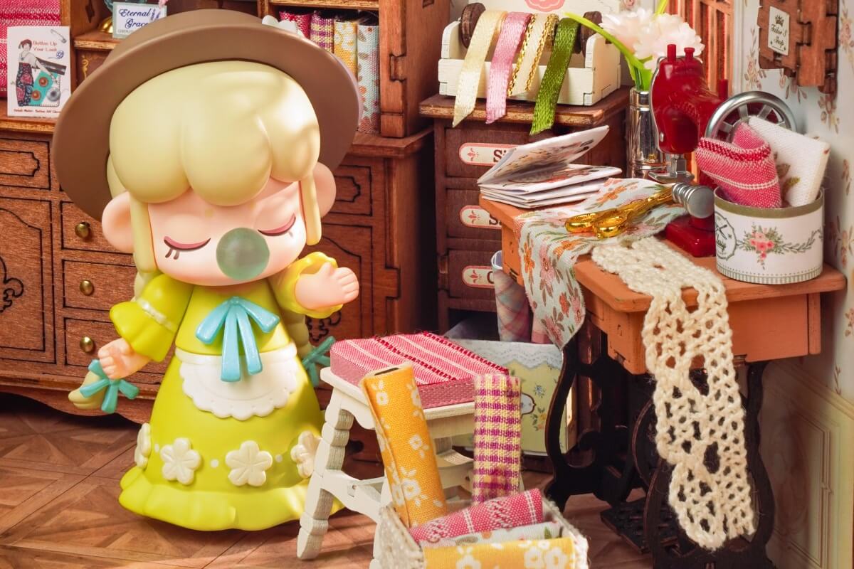 nanci is in the elsa's tailoring shop