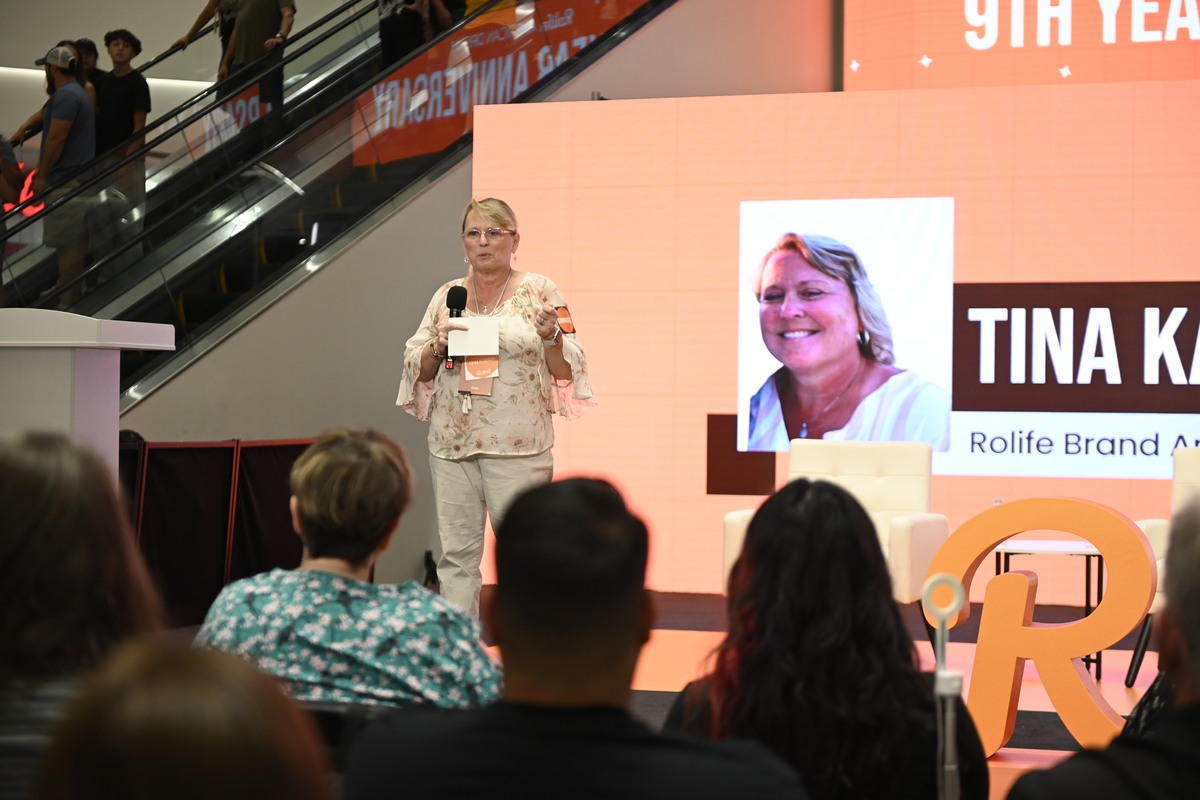 Tina Kay sharing her Rolife building story on stage