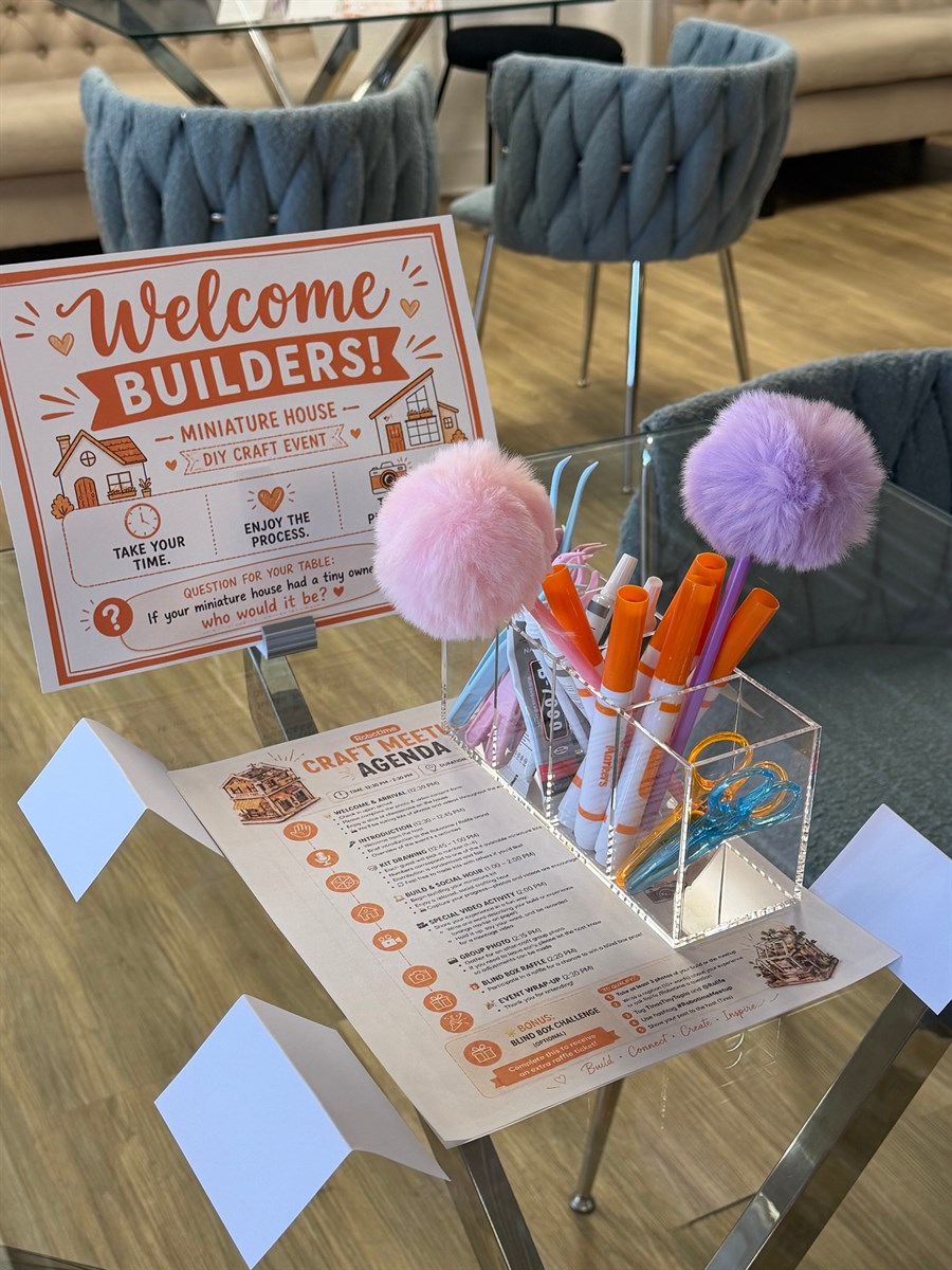 Welcome Builders sign, tools, and meetup agenda at a San Antonio craft table