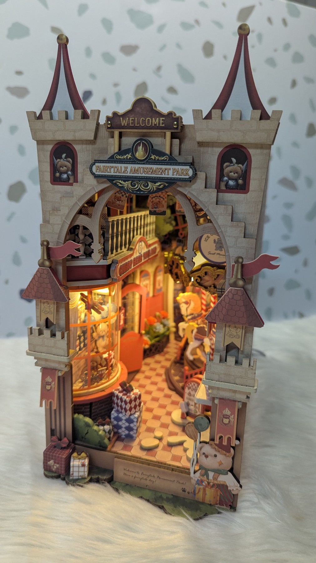 Jill Francisco's completed Rolife Fairytale Amusement Park TGB17 book nook with warm lights