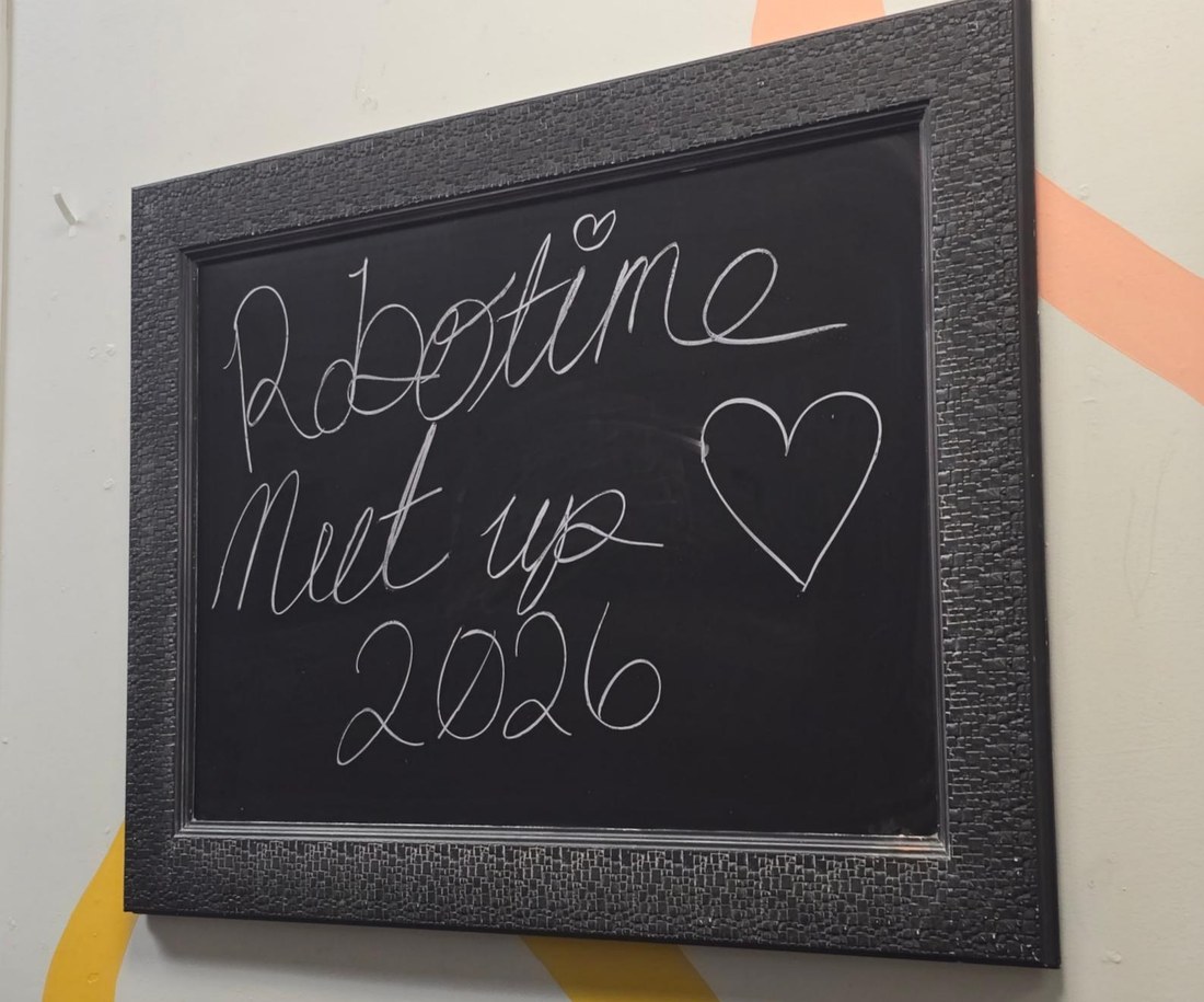 Handwritten Robotime Meetup 2026 sign at the Thunder Bay venue