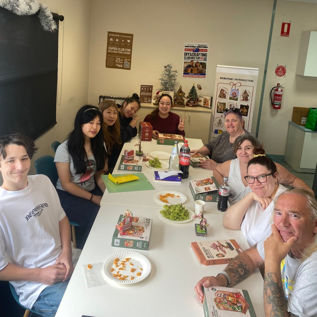 Rolife Community makers gathered around a table at a Melbourne meetup