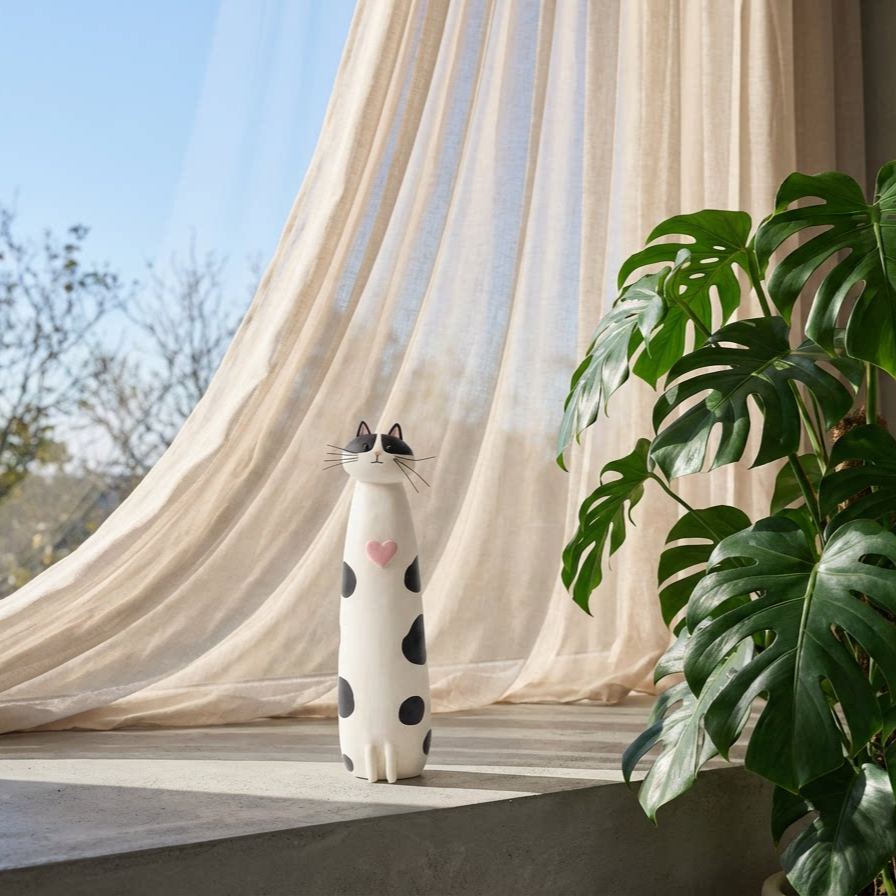 Whimsical and quirky cat figurines