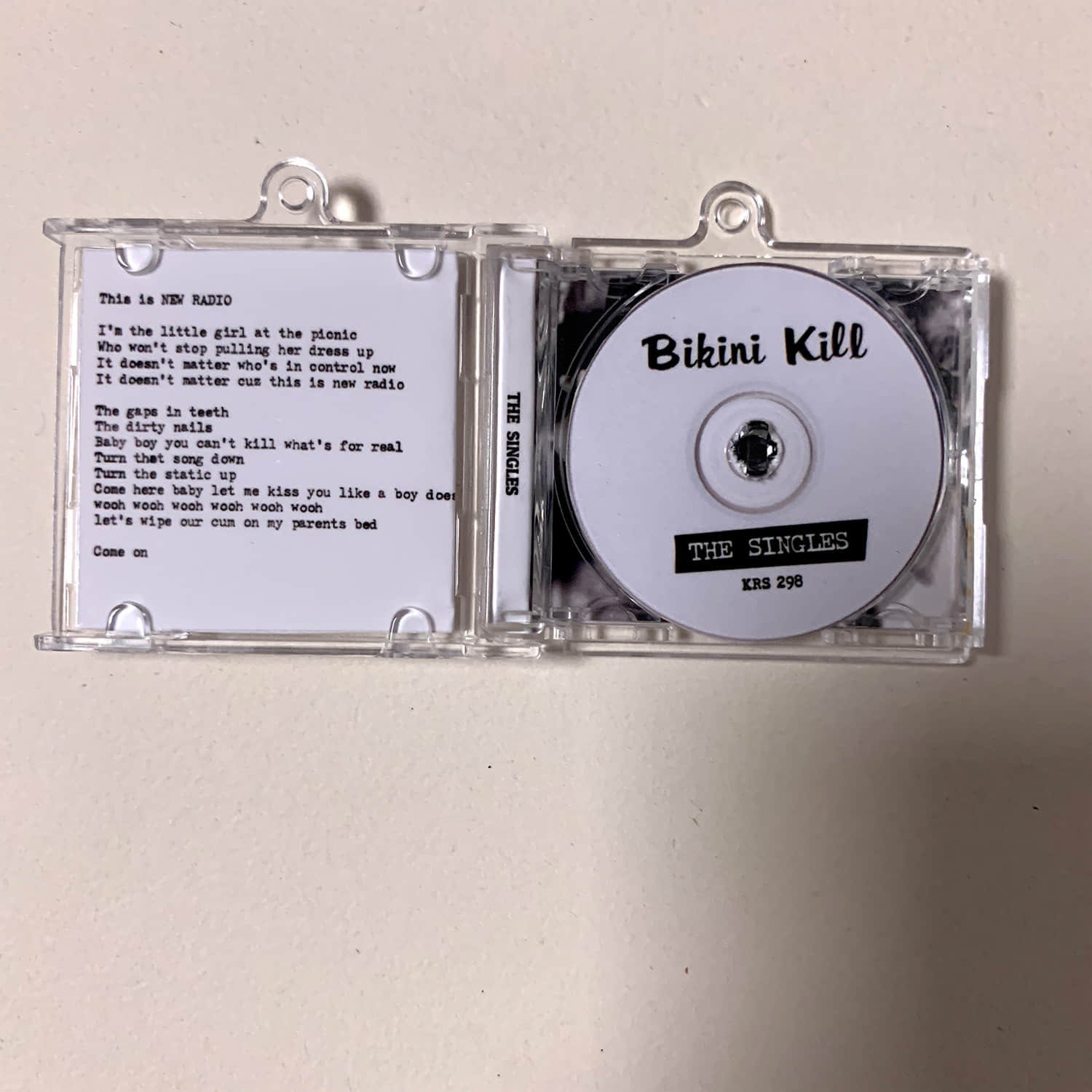 Bikini Kill Little CD Album Cover Keychains - The Singles and Pussy Whipped