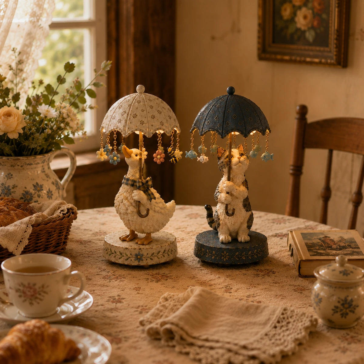 Goose and cat umbrella accent lights displayed on a cozy table