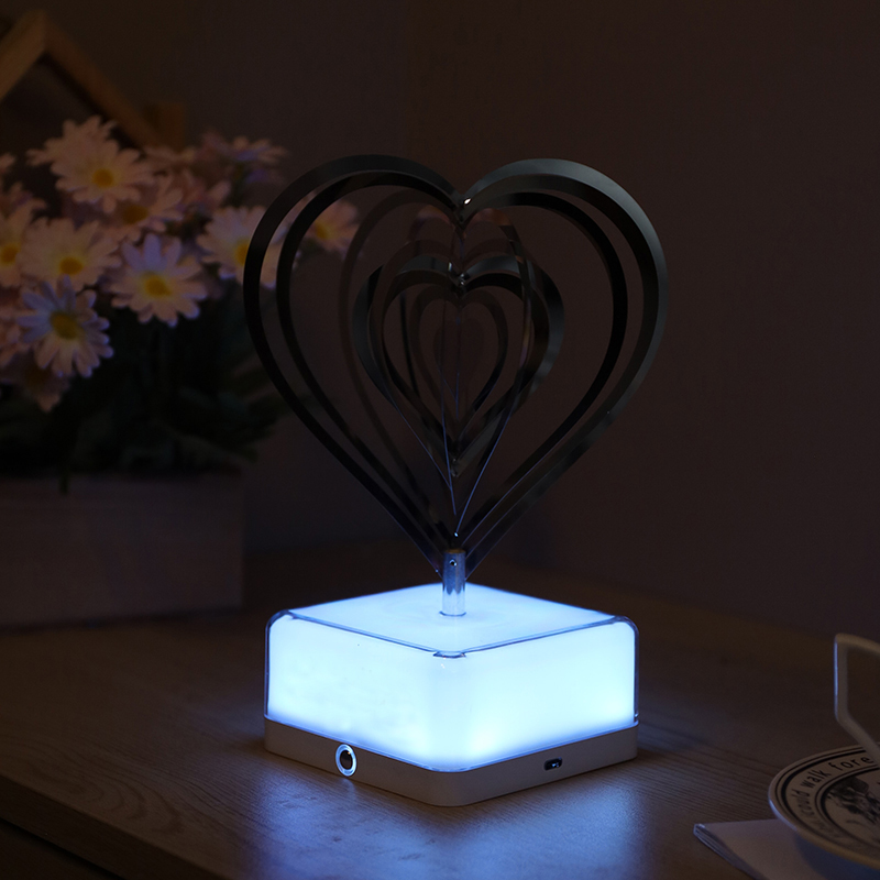 heart-shaped rotating colorful night light