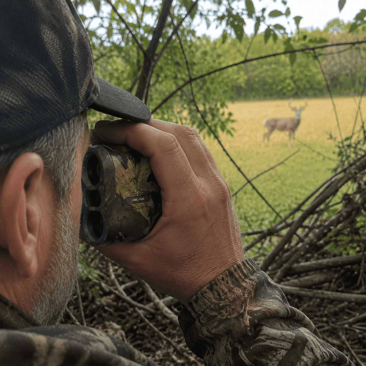 Rangefinder locking onto a deer in the field